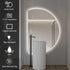 Brunswick Frameless Left Cut Moon Anti Fog Backlit LED Wall Mirror